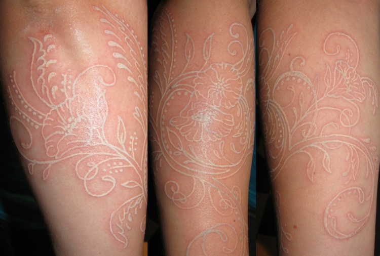 tatouage encre blanche femme- avant-bras motifs floraux arabesques