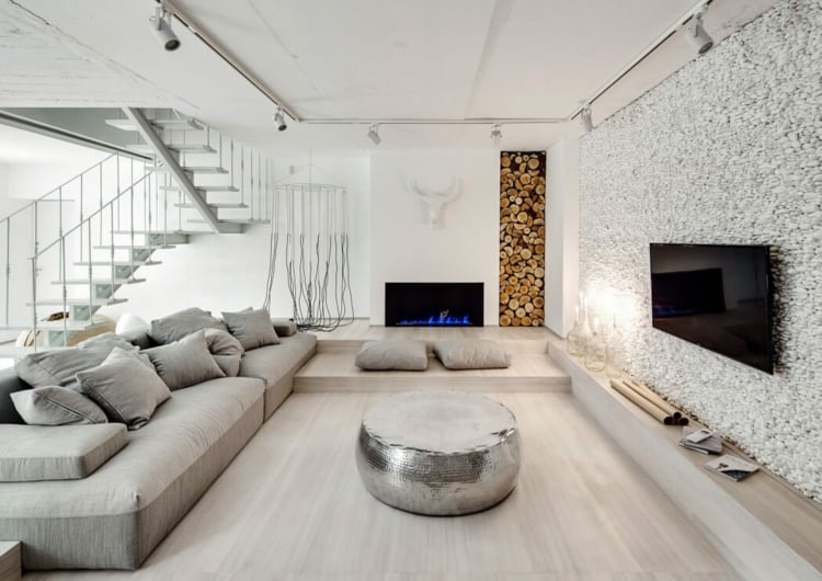 intérieur-blanc-gris-salon-design-contemporain-rangement-bois-mur-galets