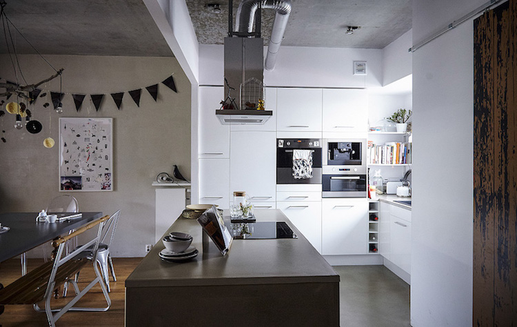 image-cuisine-moderne-ouverte-salle-manger-décorée-touches-industrielles-loft