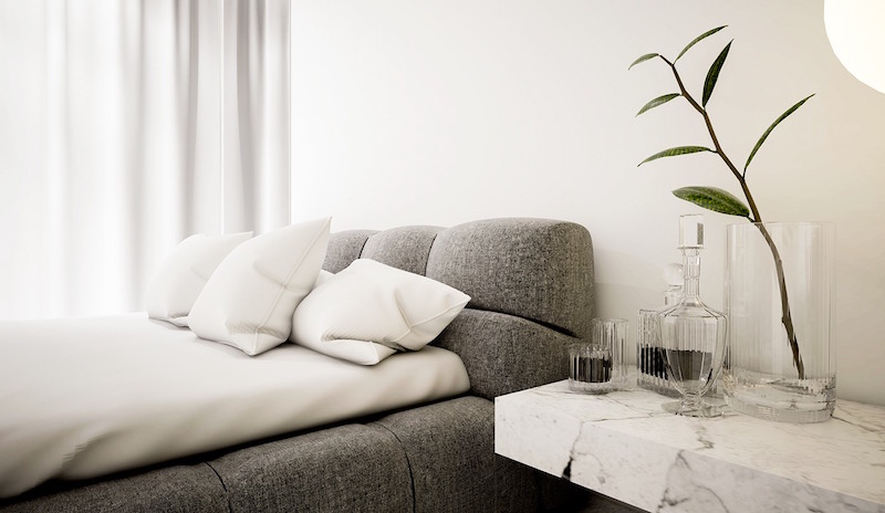 intérieur-blanc-chambre-dulte-lit-tapissé-tissu-gris-chevet-marbre