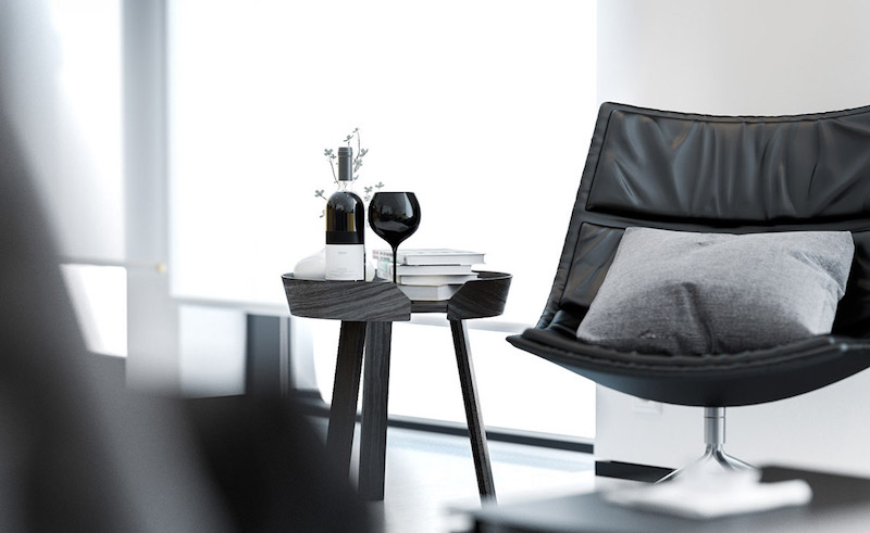 intérieur-blanc-fauteuil-cuir-pied-central-table-appoint-noirs