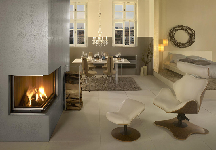 cheminee moderne -angle-habillage-aspect-béton-fauteuil-relax-design