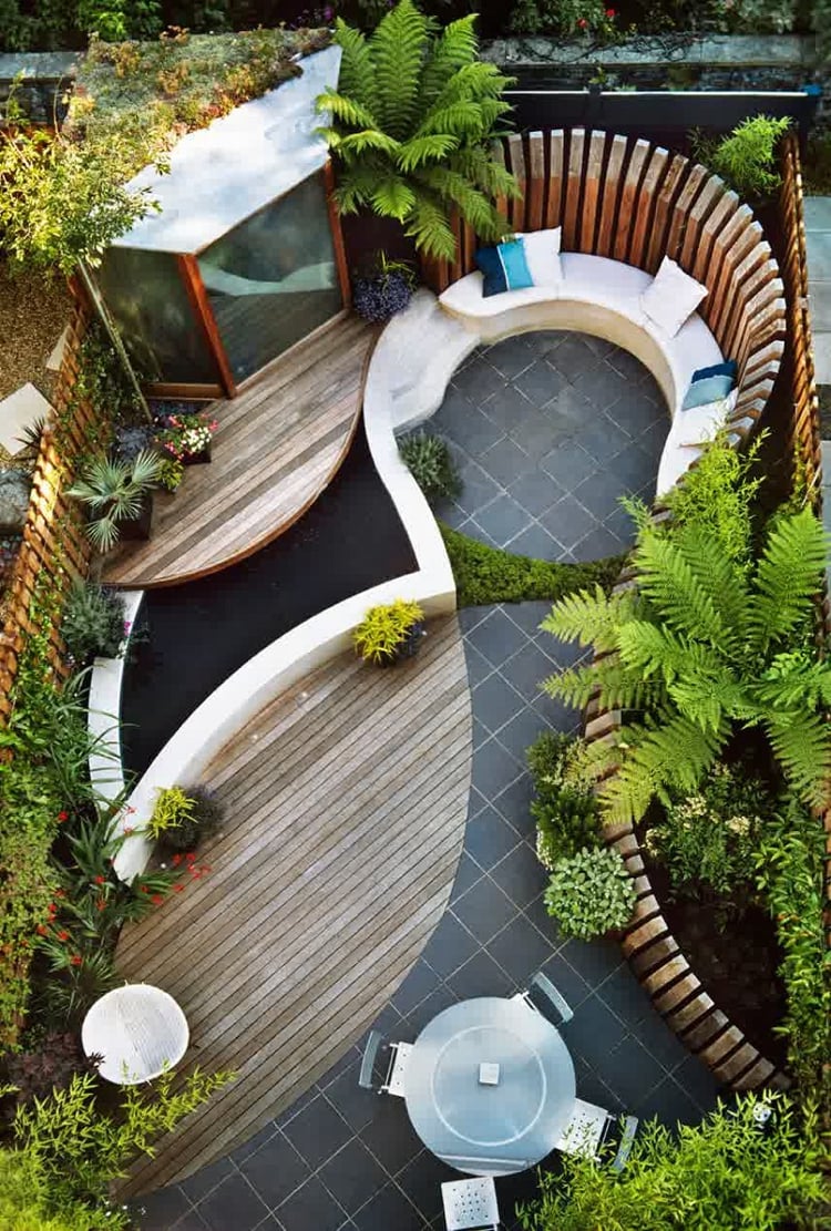 jardin sur plusieurs niveaux -jardin-moderne-brise-vue-bois-banc-ovale-coin-repas-bassin