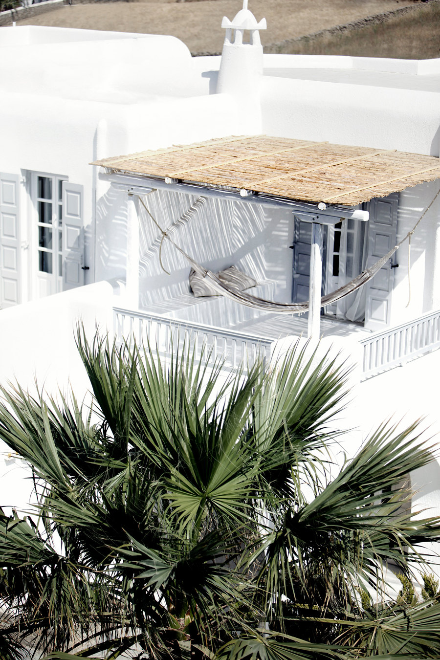 terrasse-contemporaine-san-giorgio-idées-hamac-canapé-droit