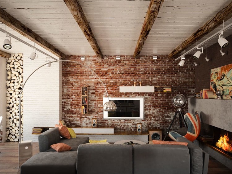mur-en-brique-rouge-blanche-salon-deco-poutres-apparentes-canape-gris-lampadaire-industriel-cheminee-beton