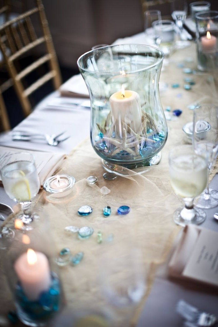 centre-table-pour-mariage-plage-bougie-cylindrique-étoiles-de-mer-billes-ver