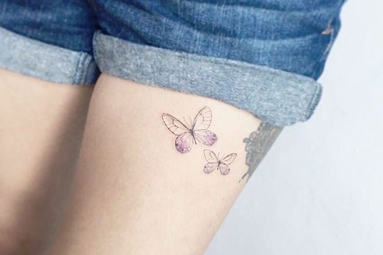 Tatouage papillon femme – signification et idées