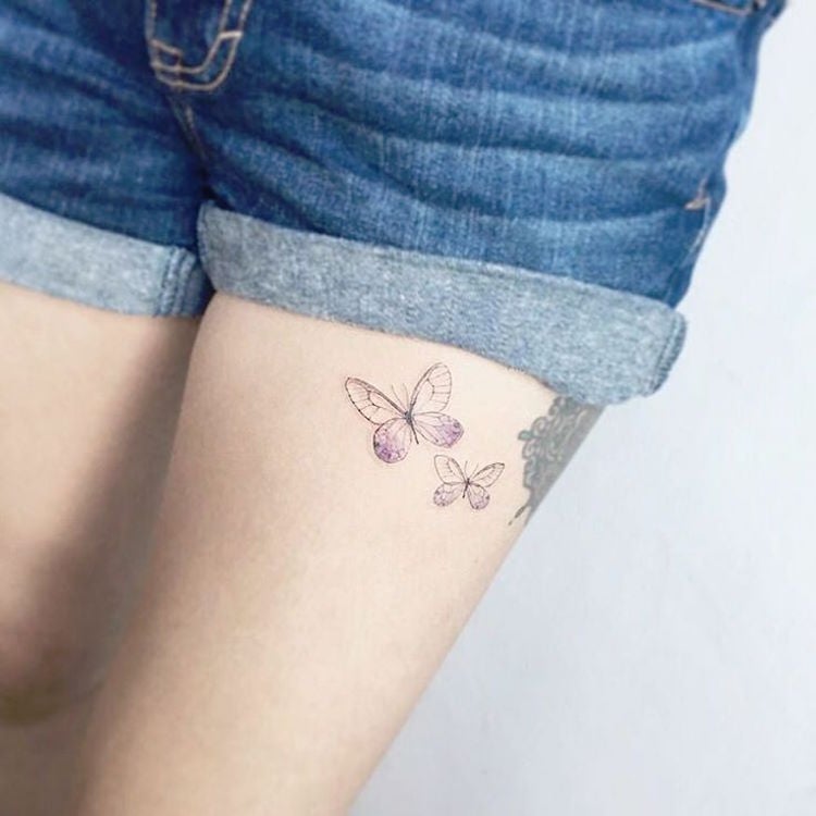 tatouage-papillon-fin-discret-cuisse-femme