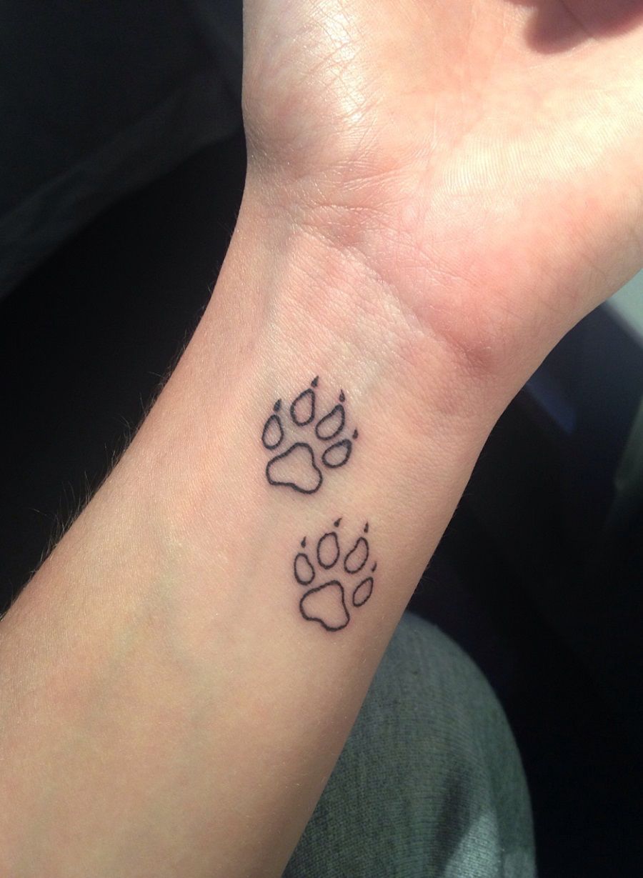 tatouage patte de loup inkage poignet design discret et minimaliste