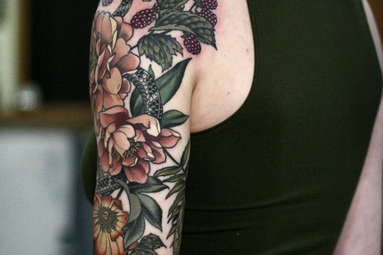 Tatouage bras femme - nos coups de cœur pour votre tatouage manchette