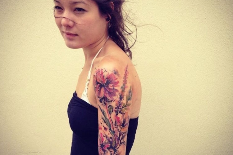 Tatouage bras femme - nos coups de cœur pour votre tatouage manchette