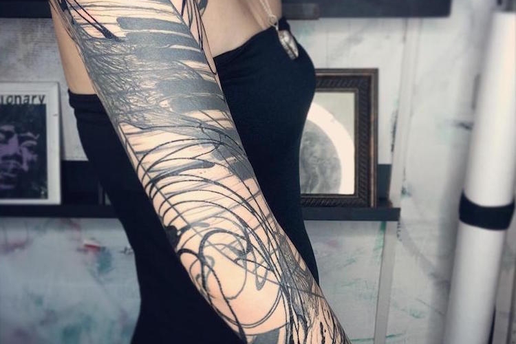 Tatouage bras femme - nos coups de cœur pour votre tatouage manchette