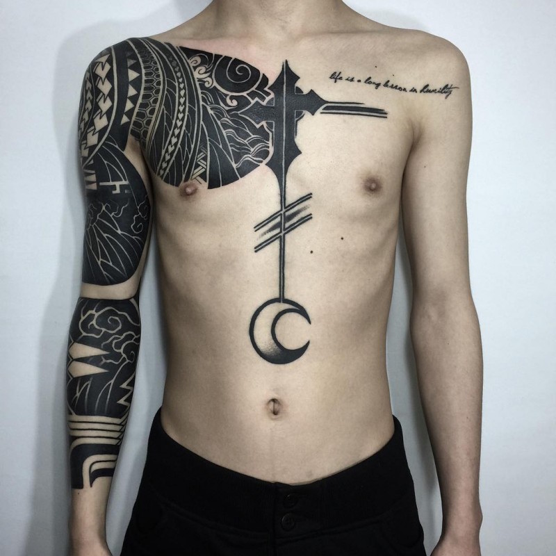 tatouage-bras-homme-blackwork-polynésien