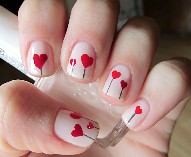 nail art Saint Valentin coeurs rouges vernis blanc