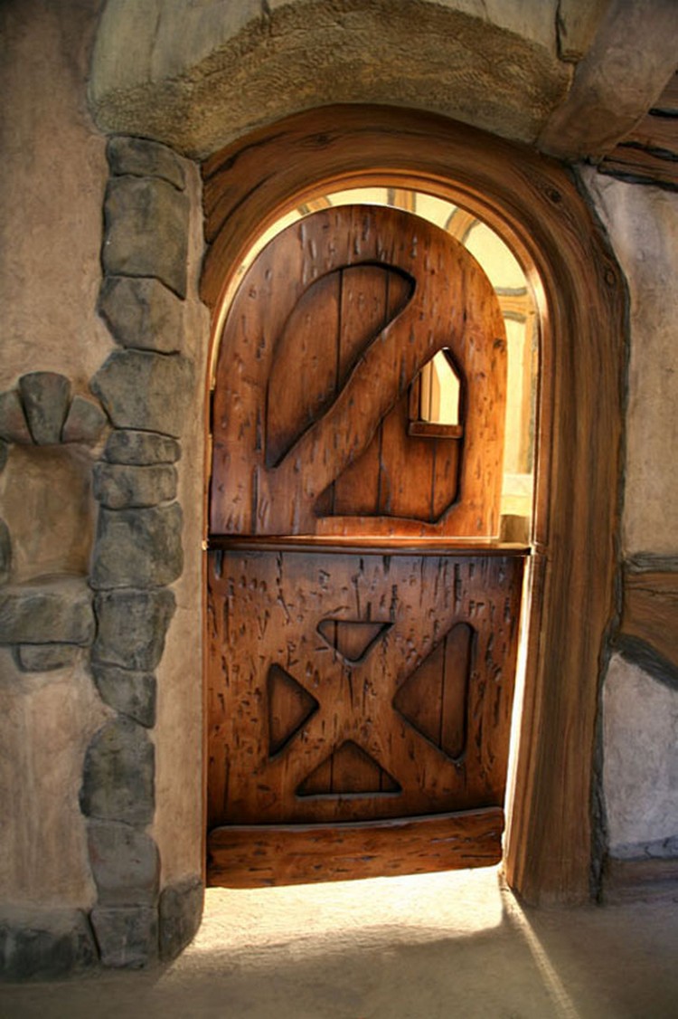 porte d'entrée sur mesure style campagnard design bois couronne porte pierres