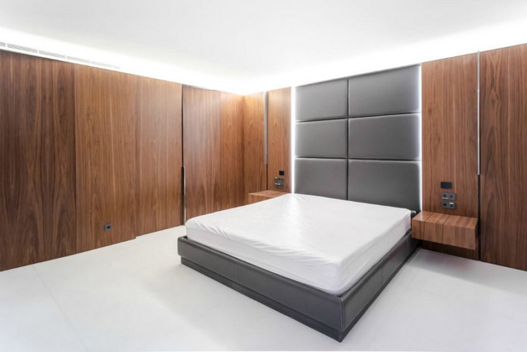 décoration minimaliste habillage mural bois chambre à coucher tête de lit en cuir