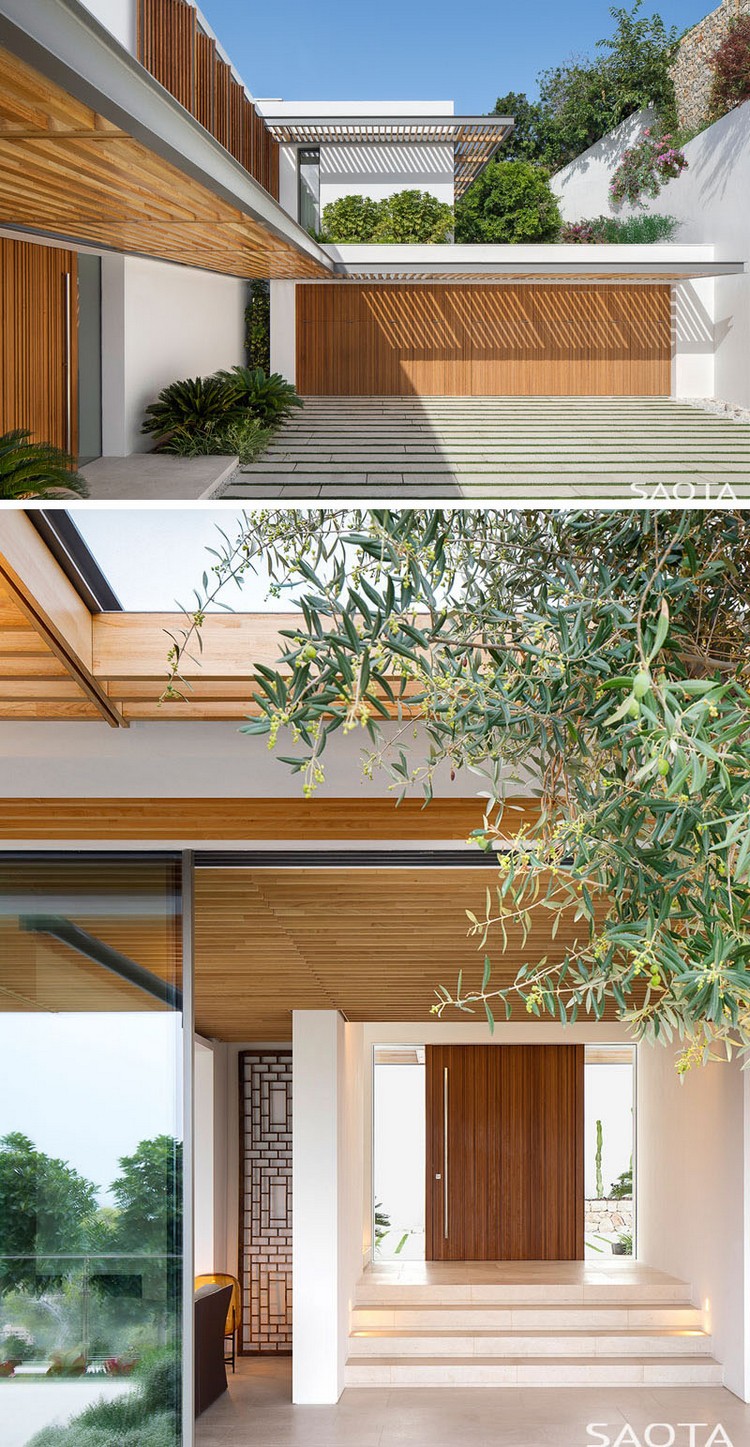 pergola bois sur mesure avec stores extérieurs bois design pliants façade briques maison architecte moderne Majorque