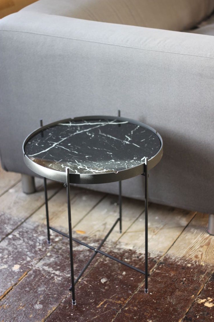 table d'appoint ronde en marbre noir et métal patiné