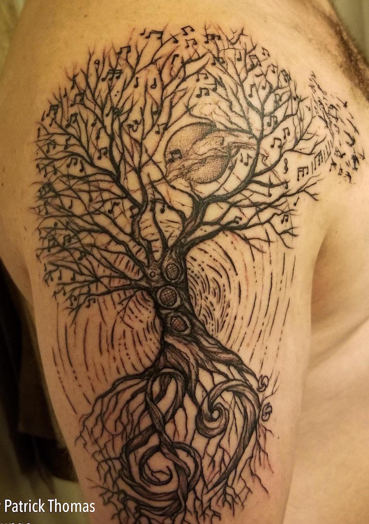 tatouage arbre de vie notes et clés pour les mélomanes
