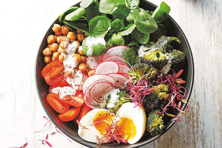 recipe for spring green salad bowl Buddha with broccoli radish tomato with chickpea eggs
