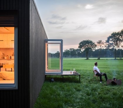 cabane bois moderne Slow Cabins avec petite terrasse sur pilotis