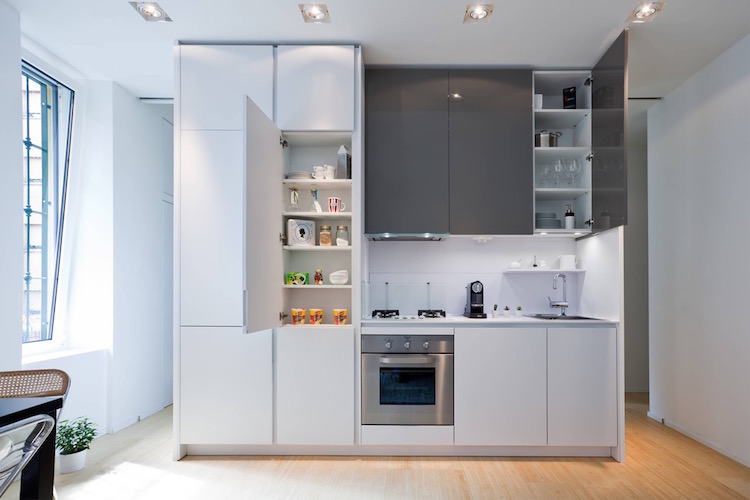 bloc cuisine en hauter séparant les zones d'un studio par WISP Architects
