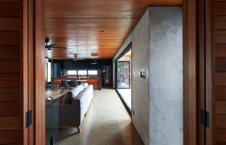baie vitrée pliante design intérieur moderne bois et béton