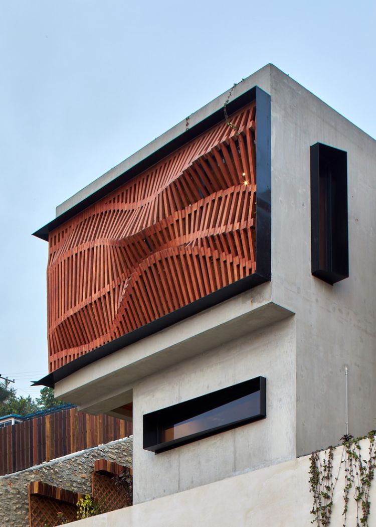 brise-soleil en bois moderne façade en béton