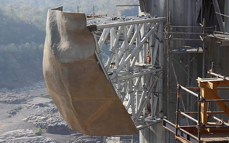 la plus haute statue du monde construction monument acier béton bronze