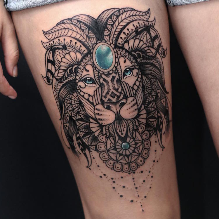 tatouage mandala lion jambe femme