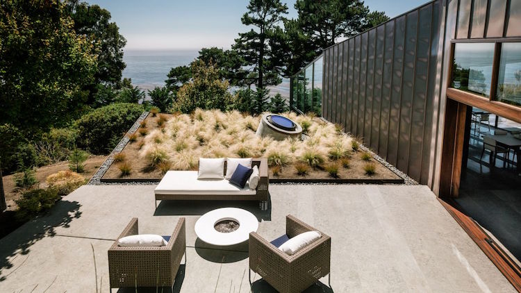 dalles de beton grand format carre graminees ornement meubles lounge vue panoramique