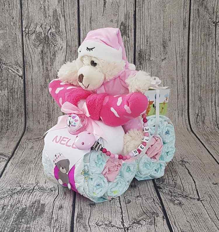 gâteau de couches DIY forme moto pour petite fille