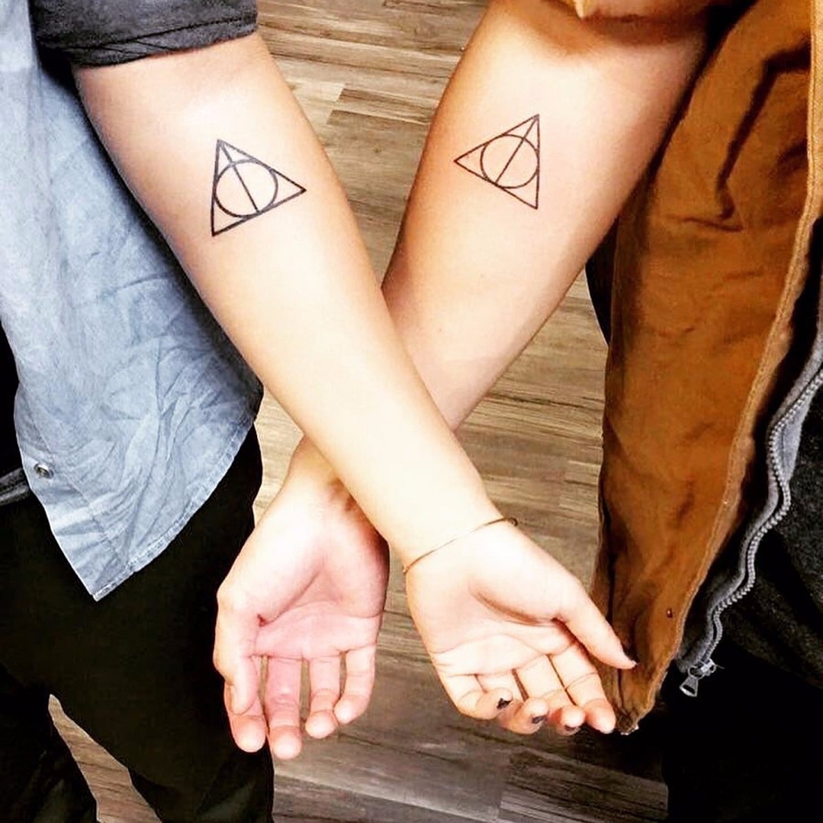 tatouage Harry Potter symbole minimaliste avant-bras