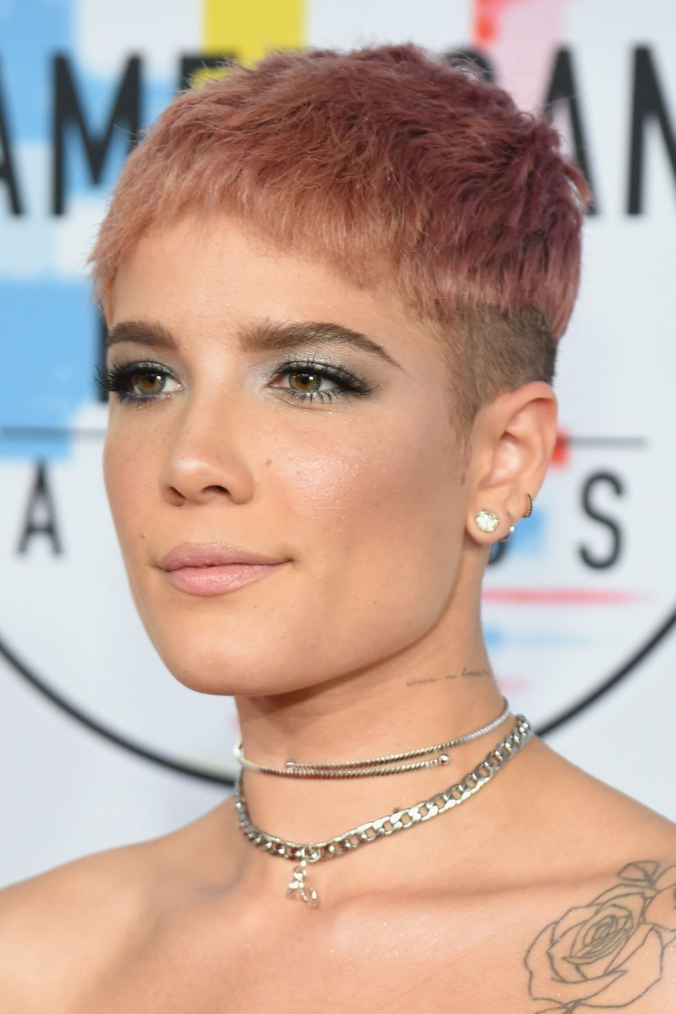 Short haircut, shaved sides, pixie cut, pink color