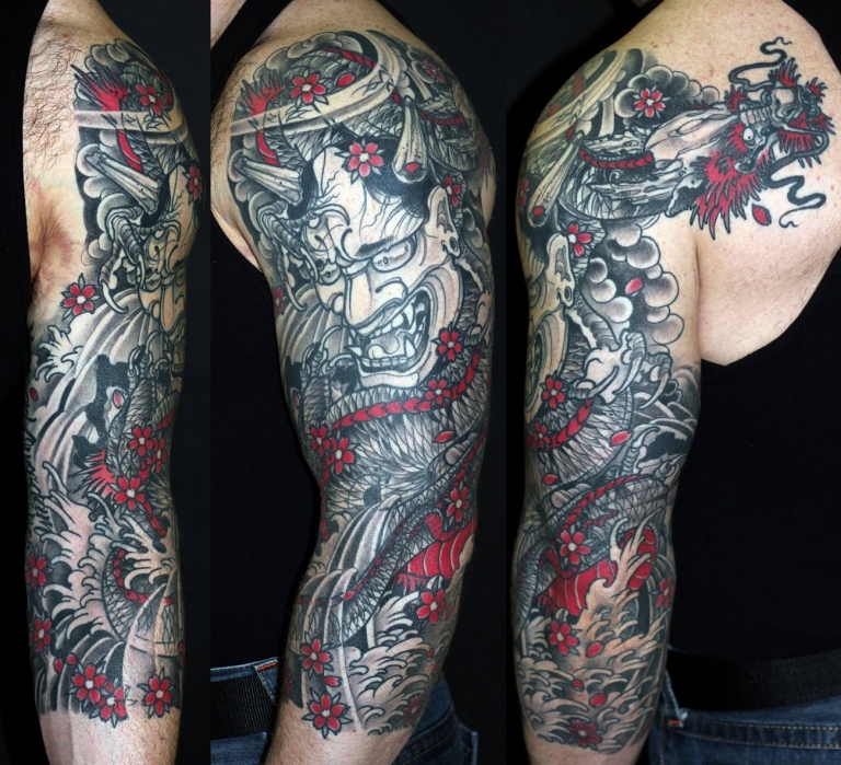 tatouage dragon japonais bras homme manchette touches de rouge