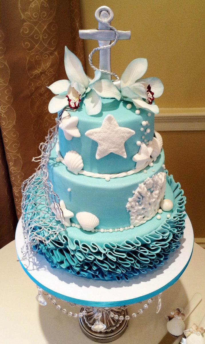 décoration de gâteau mariage 3 étages coquillages étoiles de mer ancre
