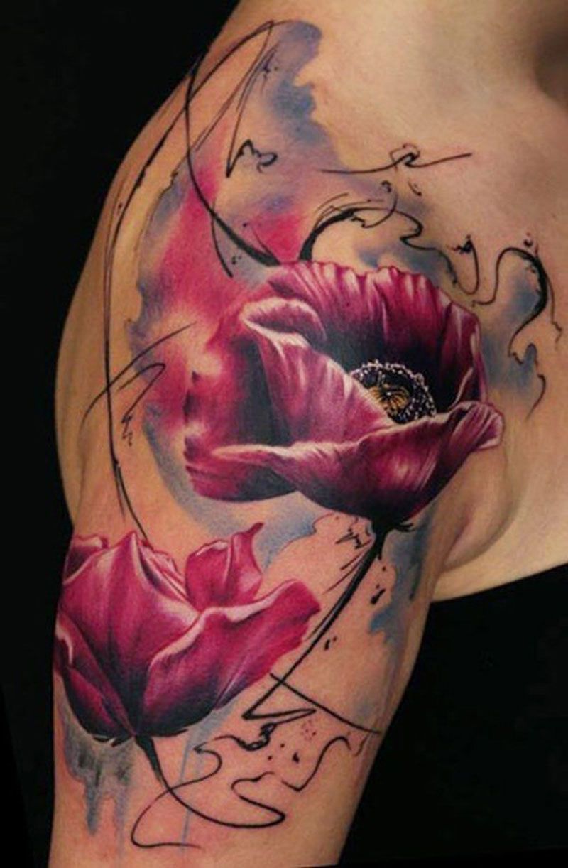 tatouage bras femme épaule fleurs colorées