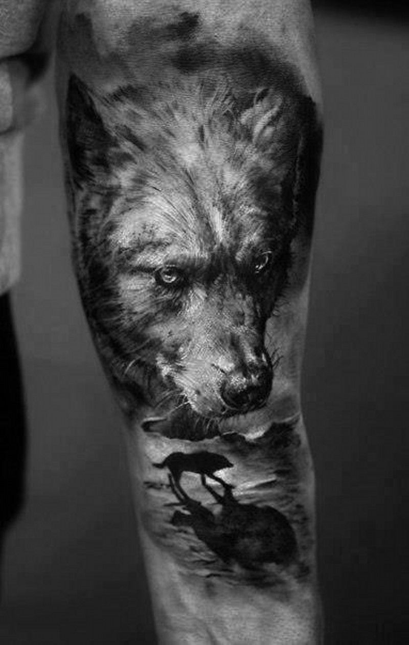 tatouage dessin original homme avant bras tête loup