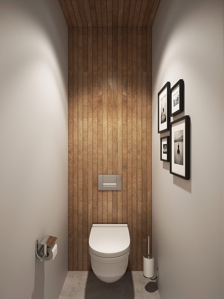 déco et aménagement petites toilettes revêtement mural parquet bois cadres photo rangements