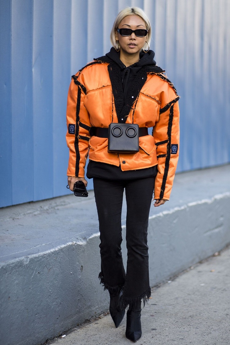 doudoune femme courte orange avec sac ceinture gucci noir