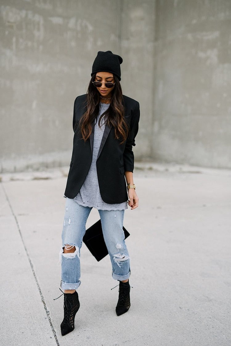 style swag avec un blazer noir et des jeans