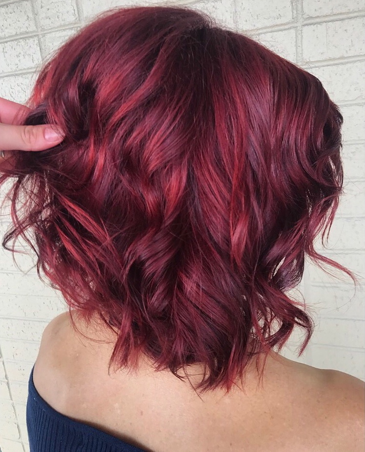 Women's 50-year-old square haircut plunging wavy burgundy red coloring on gray hair