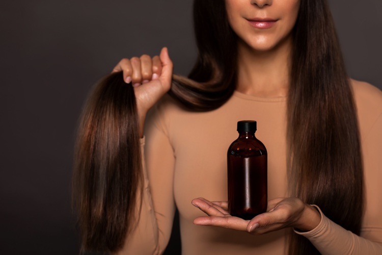 huile amande stimuler croissance cheveux