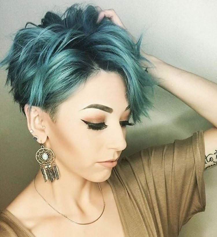 Ultra short asymmetrical blue green pixie haircut
