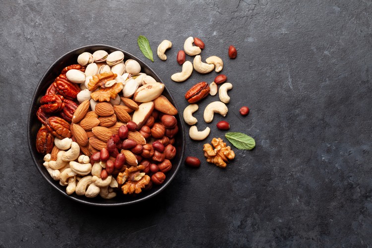 perdre du poids fruits à coque noix amandes cajou régime hypocalorique obésité surpoids étude