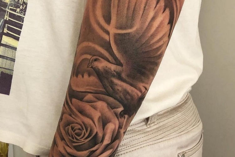 Tatouage colombe homme et femme - signification et 25 modèles