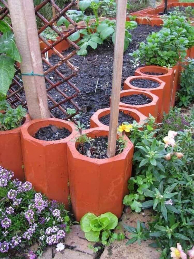 jolies bordures de jardin en tuyaux terracotta