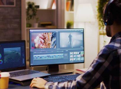 un homme édite une vidéo sur ordinateur logiciel de montage