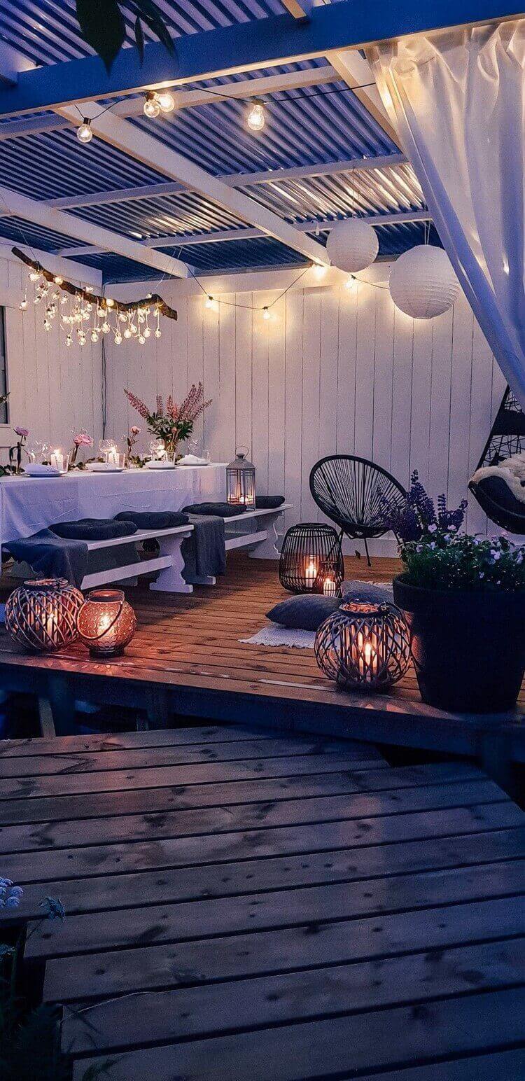 éclairage extérieur terrasse romantique lanternes guirlandes lumineuses