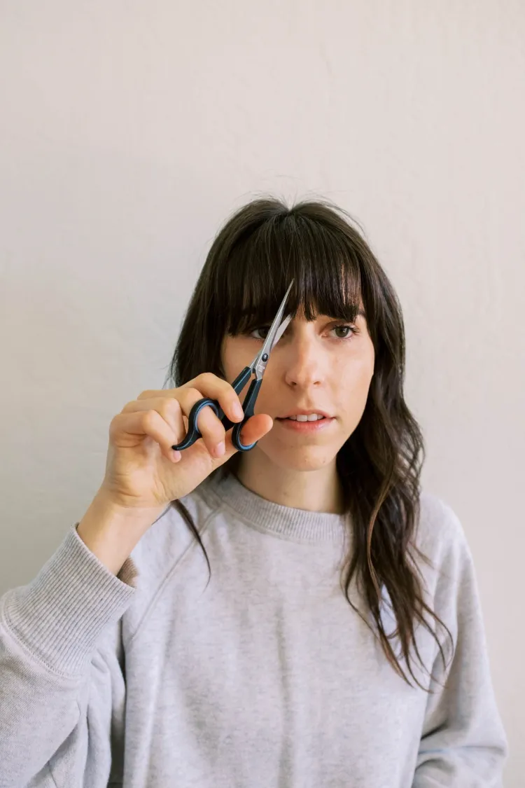 How to cut bangs on your own at home